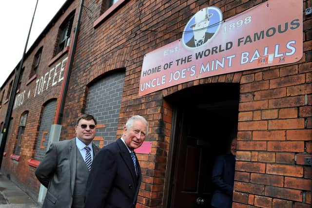 HRH Prince Charles visits the Wm Santus factory in Wigan, makers of the famous Uncle Joe's  Mintballs with John and Anthony Winnard. Picture by Paul Heyes, Wednesday April 03, 2019.