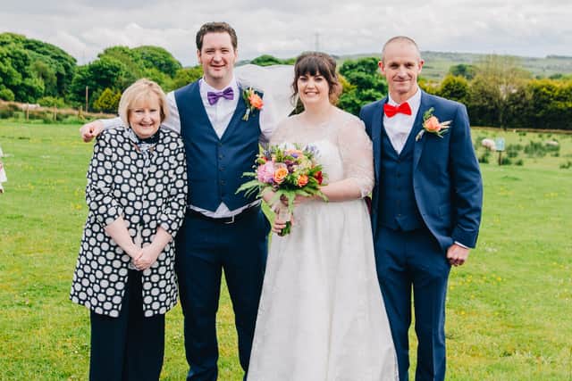 Bekah Courtney with her husband Luke and her parents at her wedding in 2017