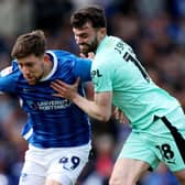 Callum Lang got little joy out of his former Latics colleagues as Portsmouth were beaten at Fratton Park