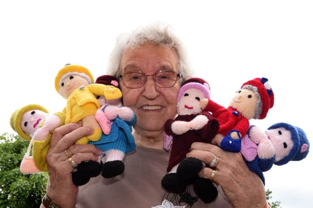 Great-grandmother Anne Aspinall with some of her knitted queens