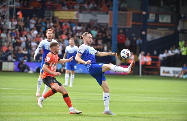 Will Keane in action at Luton