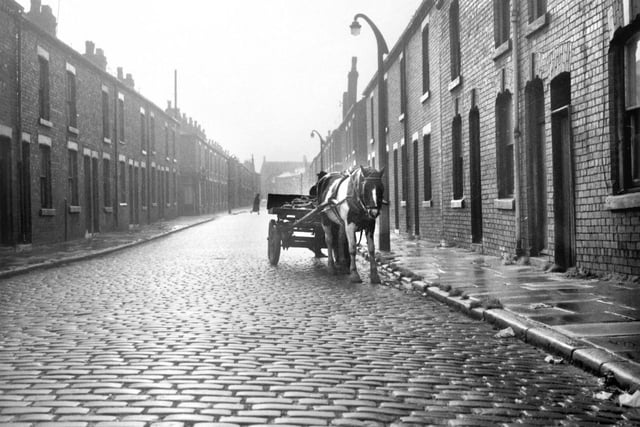 A scene from a Wigan street in the Scholes area about to be demolished in 1971.