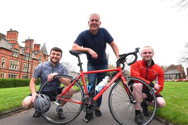 Langdon Systems colleagues, from left, Sam Richardson, Mike Oakley and Dale Hawson, are part of a team who will cycle from their office in Wigan, 250 miles to the HQ in Portsmouth in 24-hours, to raise funds for the Ukraine appeal.