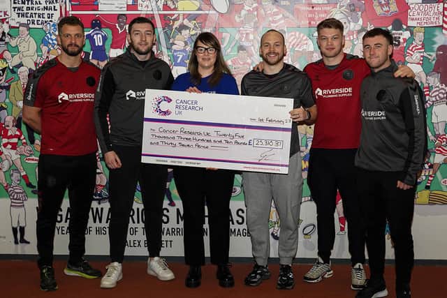 Wigan Warriors have raised over £25,000 for Cancer Research UK