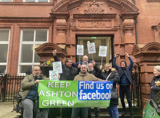 Keep Ashton Green group celebrate industrial estate refusal outside Wigan Town Hall on April 12, 2022