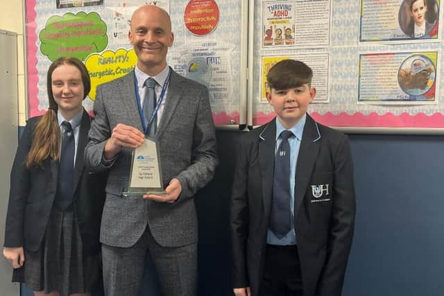 L to R: Year eight pupil, Kelsey , Headteacher, Mr Scarbourough and Year 10 pupil, Daniel.