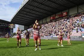 Patrick Mago thanks the fans after the semi-final victory over Hul KR at the DW Stadium