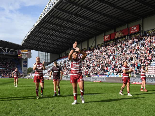 Patrick Mago thanks the fans after the semi-final victory over Hul KR at the DW Stadium
