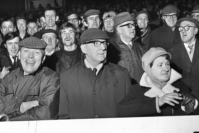 Wigan fans at the Wigan v Saints Boxing Day derby match on Monday 27th of December 1971 at Central Park.Wigan won the match 8-3 with three goals from Colin Tyrer and one from Frankie Parr.