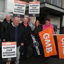 Staff and supporters on the picket outside Brocol House and Wigan Job Centre Plus, King Street, Wigan, as GMB security guards strike in a week-long walk-out