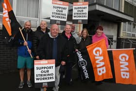 Staff and supporters on the picket outside Brocol House and Wigan Job Centre Plus, King Street, Wigan, as GMB security guards strike in a week-long walk-out