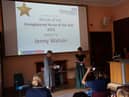 Jenny Watson is presented with the unregistered nurse of the year award by Allison Luxon, deputy director of nursing