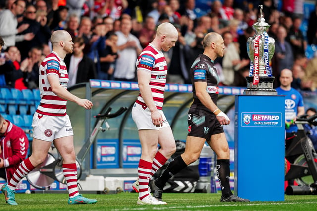 Liam Farrell leads out Wigan for the game.