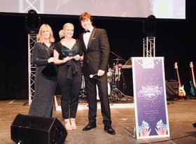Kate Garraway, left presents Zofia Goddard, centre, with the National Care Home Worker Award