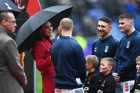 The Princess of Wales interacts with Sam Tomkins ahead of England's quarter-final (Photo by Gareth Copley/Getty Images)