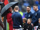 The Princess of Wales interacts with Sam Tomkins ahead of England's quarter-final (Photo by Gareth Copley/Getty Images)