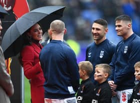 The Princess of Wales interacts with Sam Tomkins ahead of England's quarter-final (Photo by Gareth Copley/Getty Images)