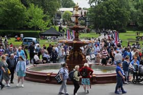 Family fun at the Jubilee Party in the Park, with food, stalls and entertainment, celebrating the Queen's platinum Jubilee at Mesnes Park, Wigan.
