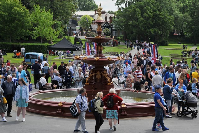 Family fun at the Jubilee Party in the Park, with food, stalls and entertainment, celebrating the Queen's platinum Jubilee at Mesnes Park, Wigan.