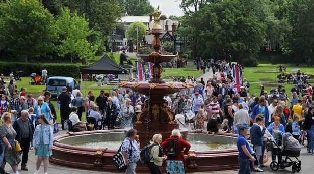 Family fun at the Jubilee Party in the Park, with food, stalls and entertainment, celebrating the Queen's platinum Jubilee at Mesnes Park, Wigan.