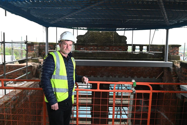 Alex McCulloch, development manager at The Heaton Group on the roof top of Mill One.