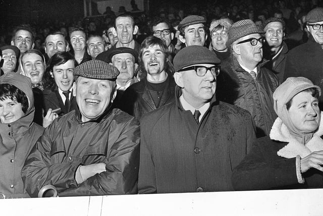 Wigan fans at the Wigan v Saints Boxing Day derby match on Monday 27th of December 1971 at Central Park.
Wigan won the match 8-3 with three goals from Colin Tyrer and one from Frankie Parr.