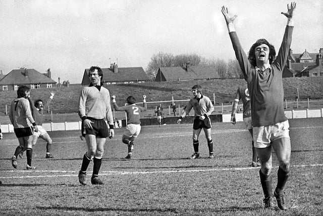 Winger Micky Worswick celebrates Wigan Athletic mid-fielder Tommy Gore's goal against Boston United in the Northern Premier League match at Springfield Park on Saturday 29th of March 1975. Latics won the game 2-1 with Johnny King getting the other goal.