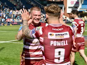 Morgan Smithies and Sam Powell celebrate at full time