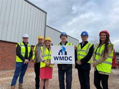 Coun David Molyneux, and representatives from Huck Construction, FWP, Wigan Council and the Wigan Metropolitan Development Company at Linstock Way.