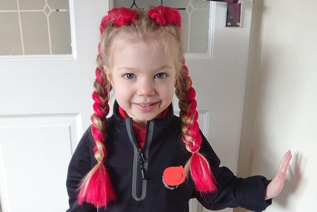Olivia, aged four, went to school with red hair
