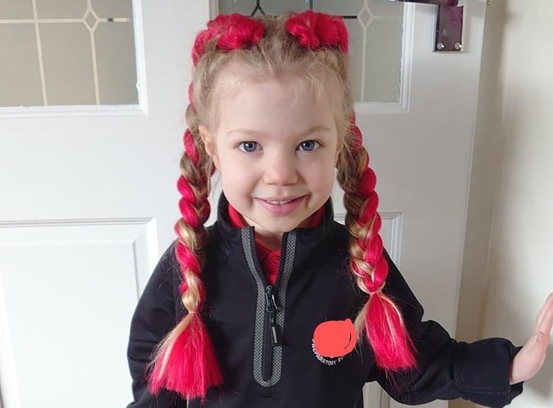 Olivia, aged four, went to school with red hair