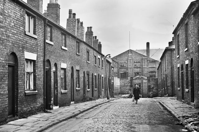 The Brown and Haigh clothing factory at the end of Wood Street, Wigan, in the 1960s.
Billy Davies, Wigan's well known gay man, who worked as an attendant at the Ritz cinema for many years, lived in the street and used to berate the workers for walking over his newly mopped front.