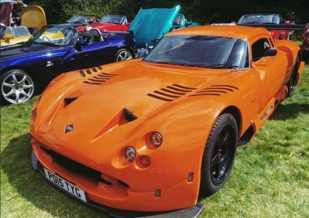 A bright orange TVR was one of the stars of the show