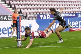 Jacob Douglas will remain with Wigan Warriors for the 2025 Super League season