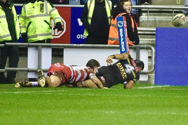 Jai Field stops Taylan May with one of three try-saving tackles