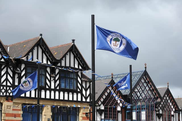 The Wigan Athletic flag was flying proudly over the town centre 10 years ago