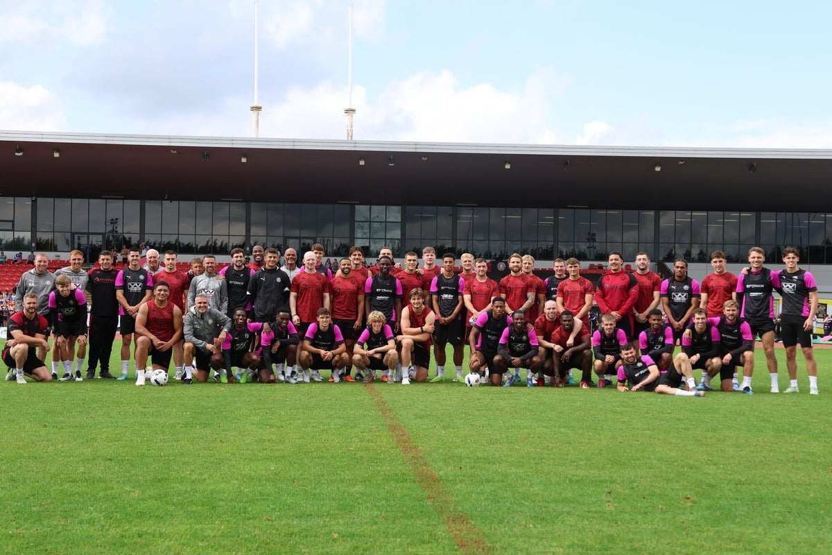 GALLERY: 27 of the best pics as Wigan Athletic and Wigan Warriors train together in front of their fans at Robin Park