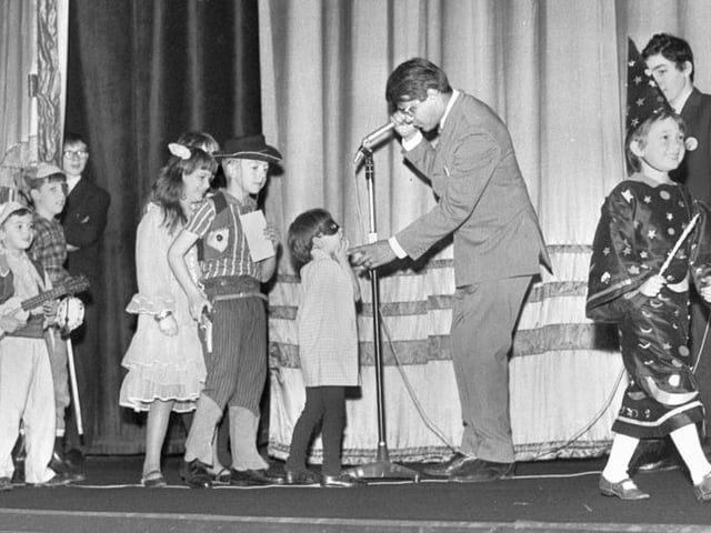 1968 - Cinema manager, Derek Fuller, talks to fancy dress competition entrants at he ABC Minors 21st birthday celebrations in 1968.