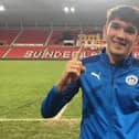 Kyle Joseph celebrates after scoring his first senior goal for Latics at Sunderland in 2020-21