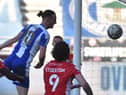 Will Keane forces home Wigan's third goal