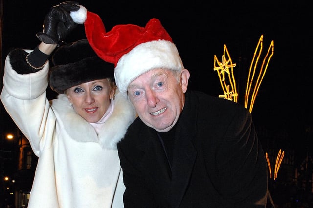 Paul Daniels and Debbie McGee turn on the lights at Wigan's Christmas Light switch