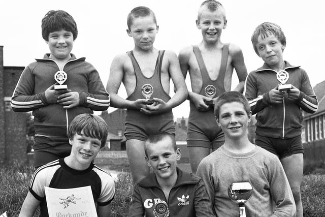 Young wrestlers from Riley's Gym in Whelley who gained overall 2nd place in an international tournament in Belgium in June 1983.
The lads are, front, left to right, Warren Moorfield, John Hughes and Paddy Goven. Back, left to right, Terry Goven, Tony Leyland, Neil Maxwell and Anthony Wooley.