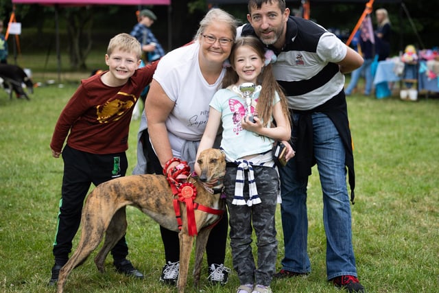Makants Greyhound Rescue dog show at Astley St Park. Elliott, Shirley, Octavia and Chris Quinn with Coco.