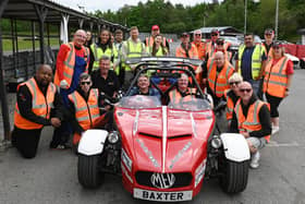Some of the team at Speed of Sight, as the charity host a track day, inviting visually impaired and people with disabilities who otherwise wouldn't be able to get behind the wheel, drive at Three Sister Race Circuit, Ashton-in-Makerfield,