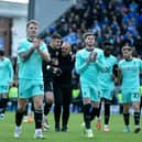 Latics players thank the travelling fans after last weekend's victory at League One champions Portsmouth