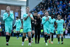 Latics players thank the travelling fans after last weekend's victory at League One champions Portsmouth