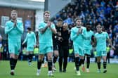 Latics players thank the travelling fans after last weekend's victory at League One champions Portsmouth