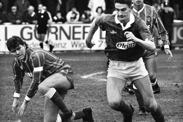 Wigan Athletic wing-back Ian Baraclough takes on the Bristol City defence in a Division 3 match at Springfield Park on Saturday 7th of April 1990.
Latics lost the game 2-3 with Ian Baraclough and Joe Parkinson getting the goals.