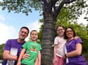 James and Lois Rowland at Wigan Infirmary's Tree of Hope with their children Benjamin, six, and Molly, nine