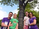 James and Lois Rowland at Wigan Infirmary's Tree of Hope with their children Benjamin, six, and Molly, nine